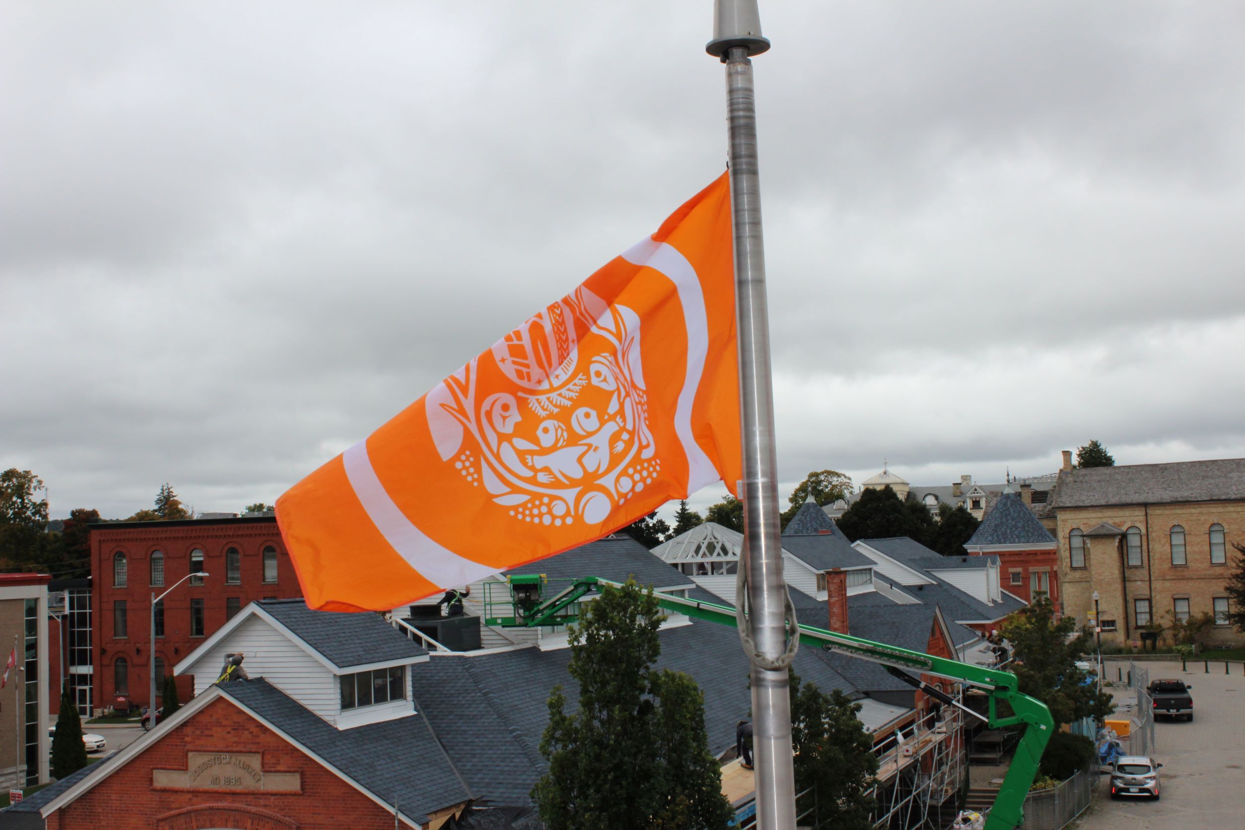 Orange survivors flag flying outside OCAB 