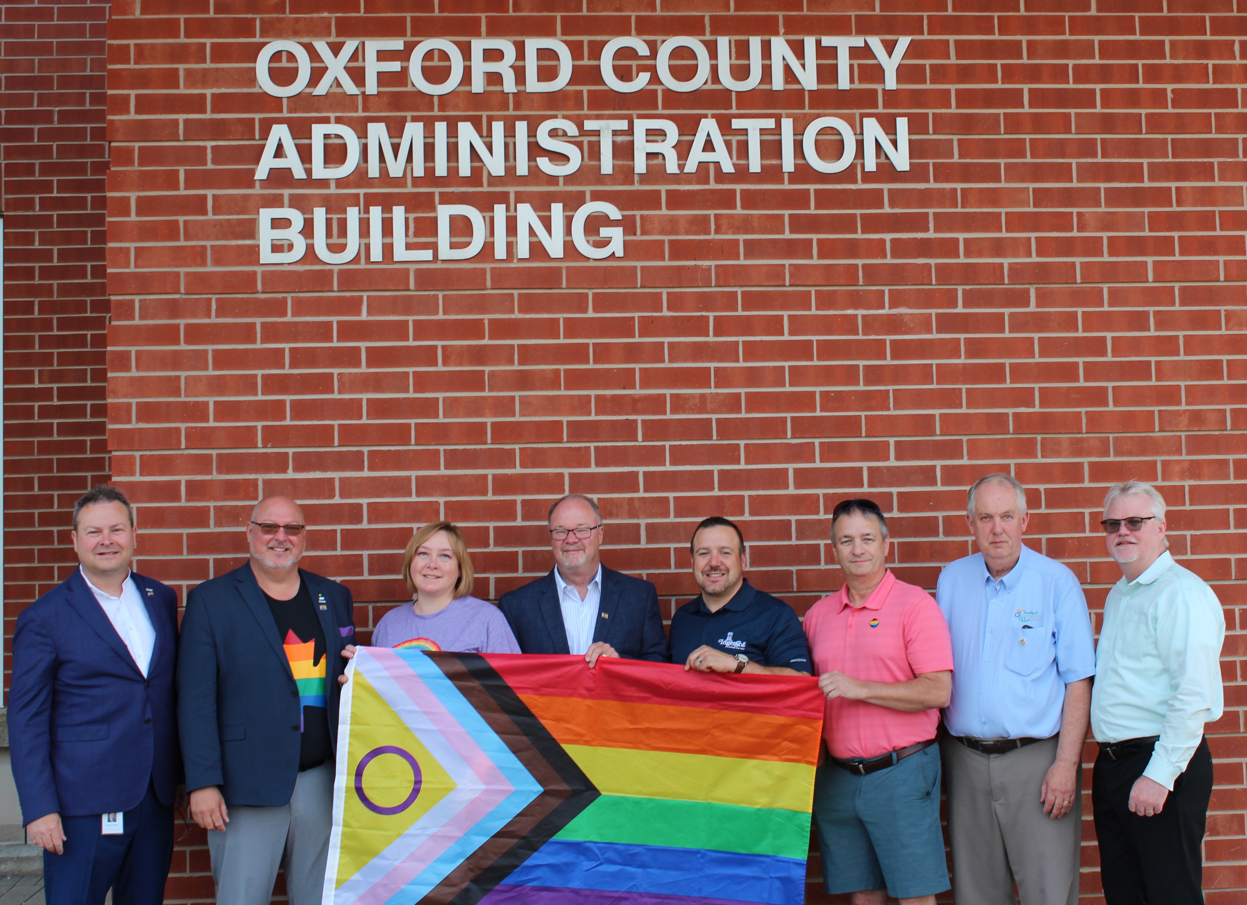 Members of Oxford County Council and the CAO with a Progress Pride Flag