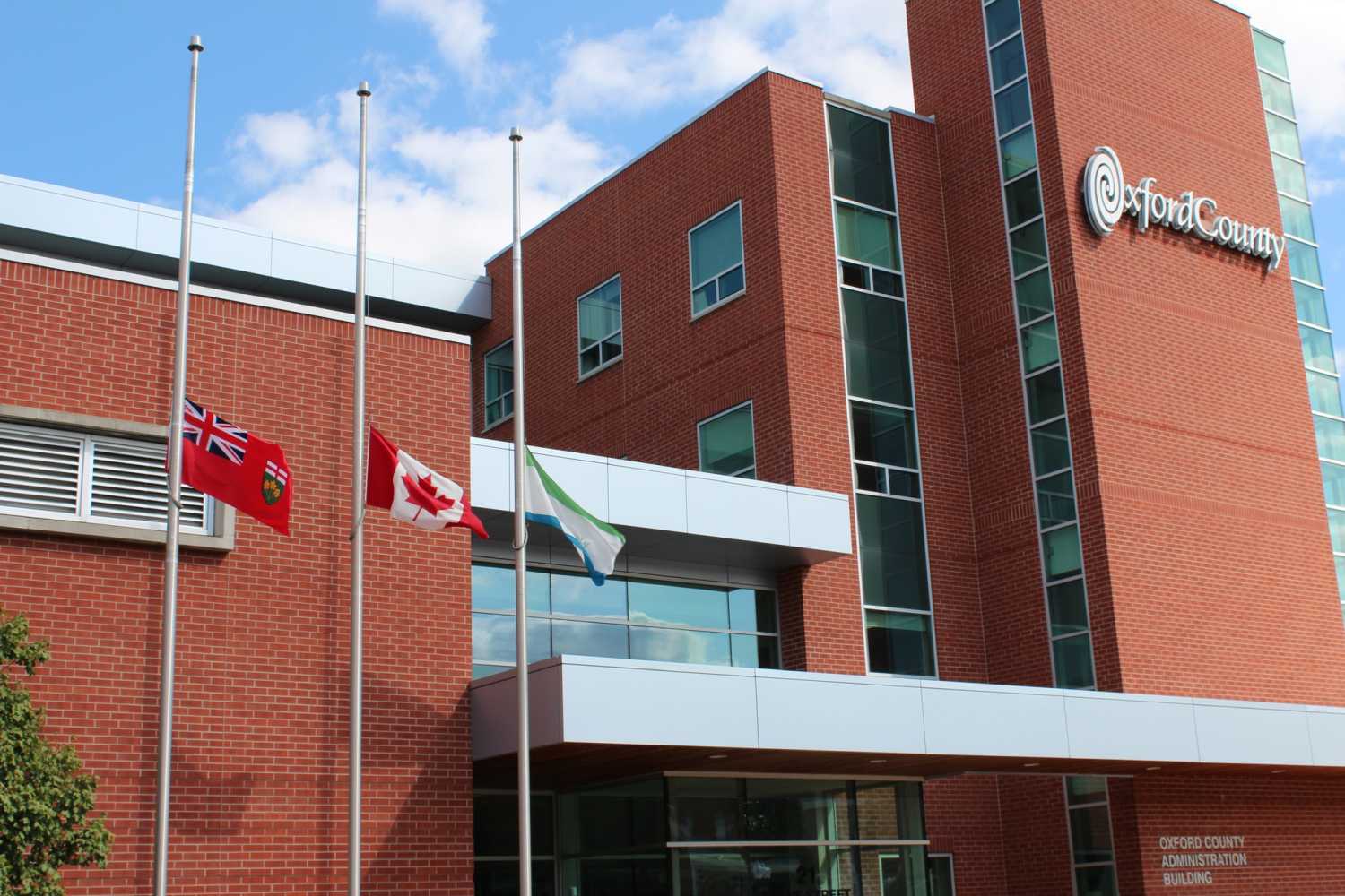 Flags flying at half-mast outside the Oxford County Administration Building