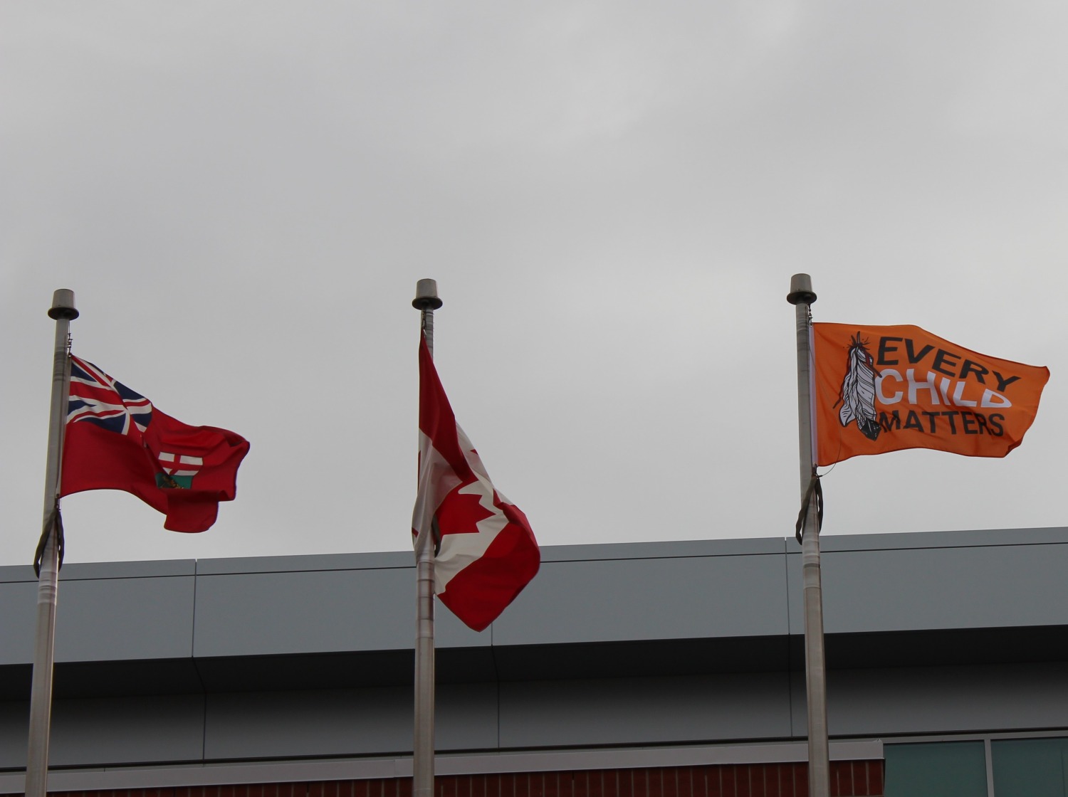 Every Child Matters flag flying at OCAB