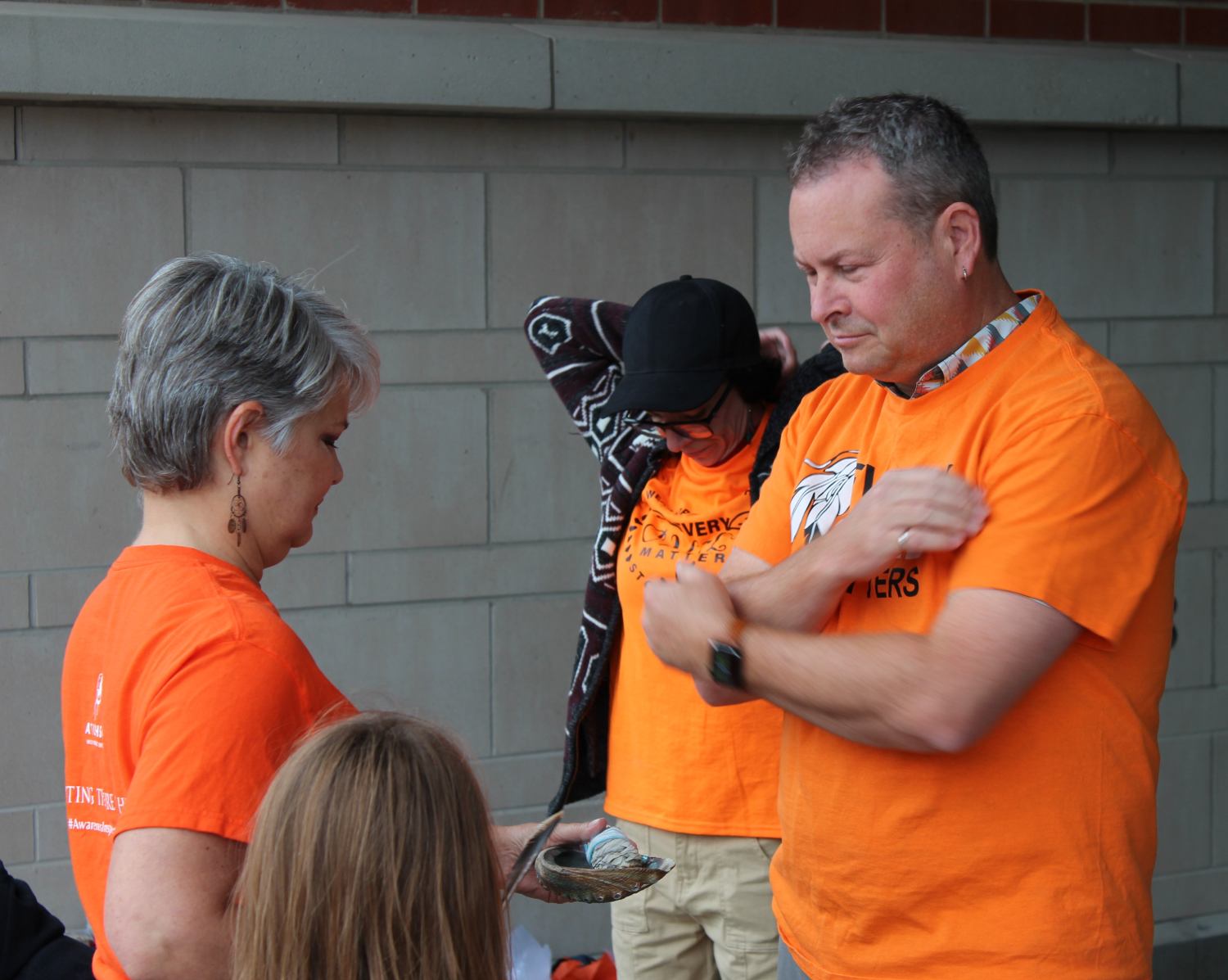 Warden Ryan taking part in a tradtional cleansing