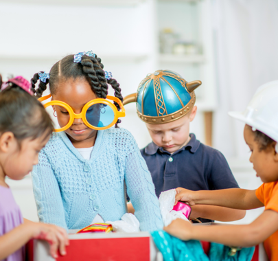 Young children playing dress-up