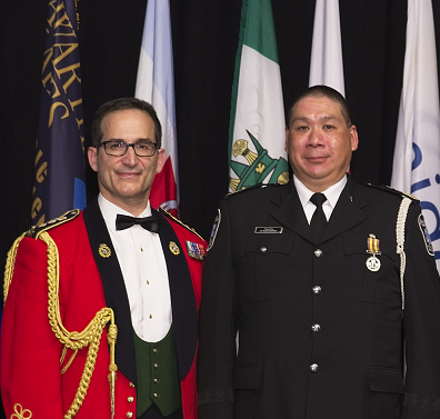 Terry Chiu receiving Exemplary Service Medal 