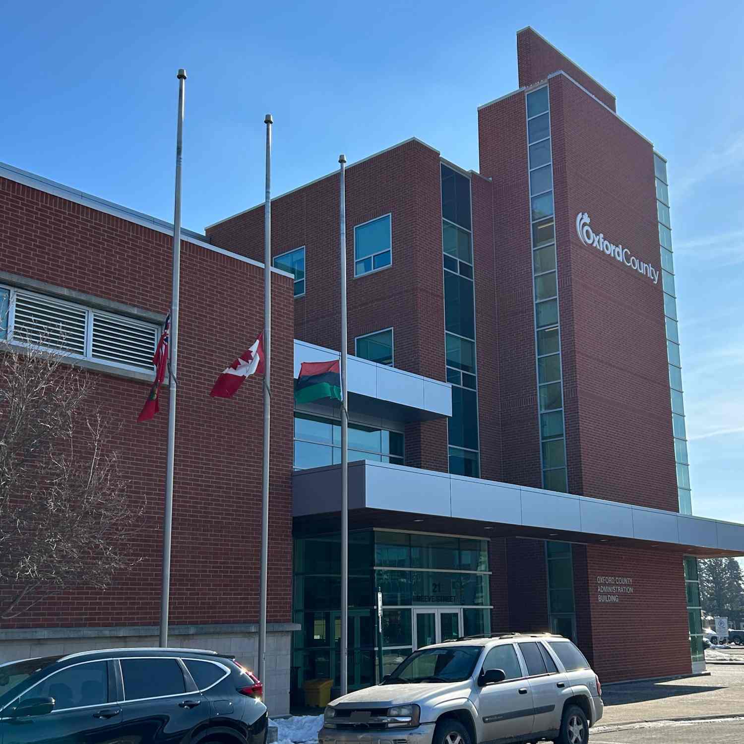 The Pan-African flag at half mast in front of the Oxford County Administration Building in honour of Black History Month